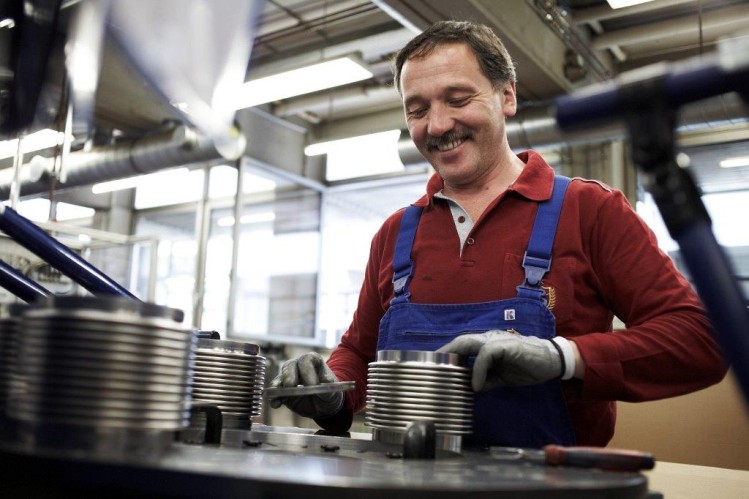 employee working with bellow
